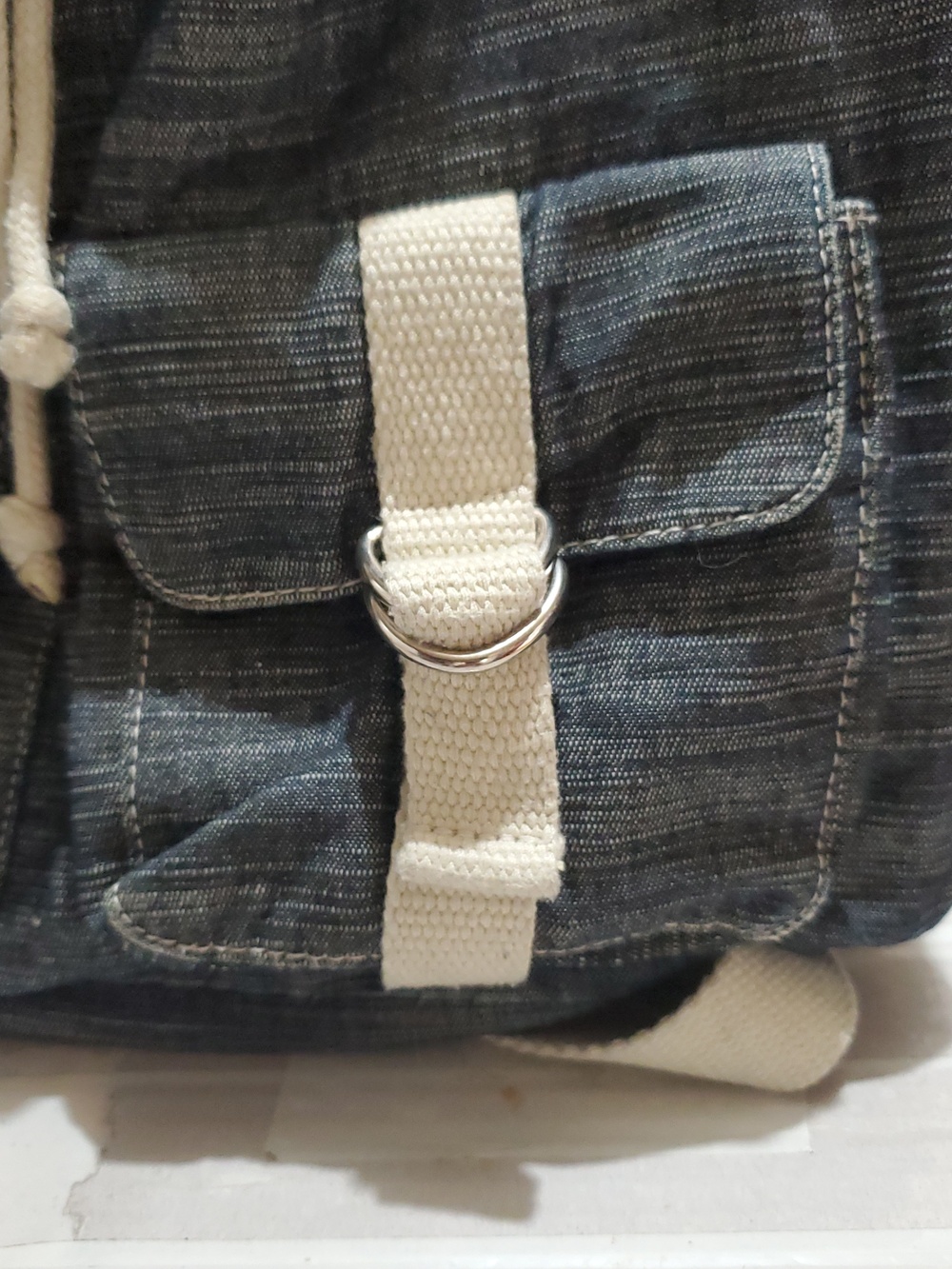 Denim-Look Drawstring Backpack with Cream Strap Details - Picture 3 of 12